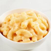 Mac & Cheese · Elbow macaroni noodles with creamy cheddar, American and Neufchatel cheese.