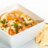 Greek Lemon Chicken Soup · Bowl of our fresh homemade Lemon Chicken Soup served with Soft Pita.