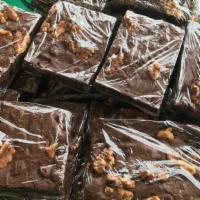 Brownie · Ghirardelli triple chocolate brownie topped with walnuts