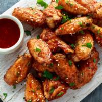 3 Jumbo Wings · Smoked or fried, and served plain or tossed in BBQ, spicy BBQ, hot or buffalo dip.