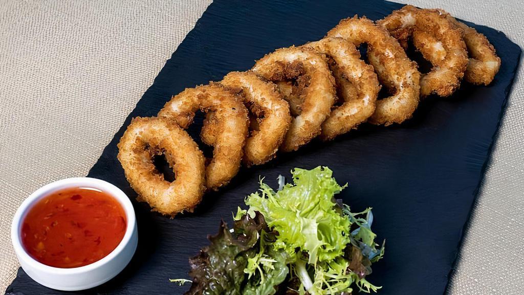 Onion Rings · Vegetarian. Scrumptious beer-battered and fried onion rings.