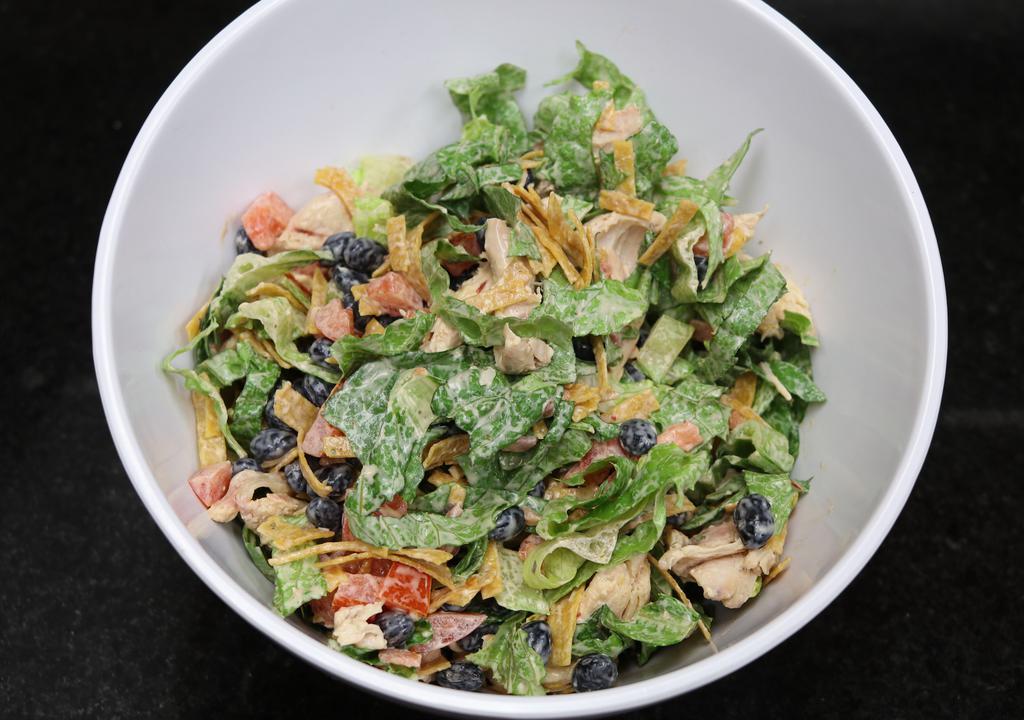 Carali’S Salad · Pulled rotisserie chicken | romaine lettuce | diced tomatoes | black beans | tortilla strips | carali’s dressing.