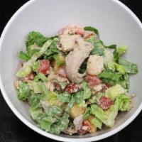 Caesar · Pulled rotisserie chicken | bacon | romaine lettuce | diced tomatoes | croutons | caesar dre...