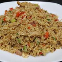 Chaufa Rice · Fried rice. pulled rotisserie chicken fried rice bacon green onions red peppers egg and peru...