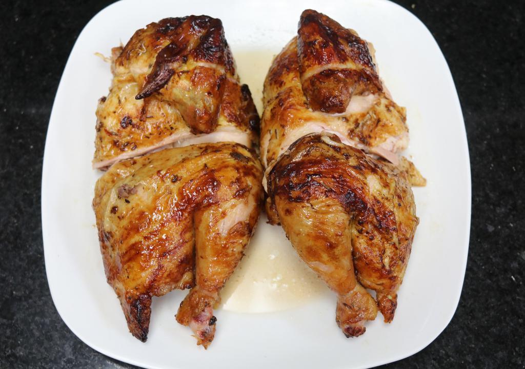 Whole Chicken · All-natural chicken marinated in peruvian spices and cooked to golden perfection in custom charcoal rotisserie ovens.