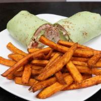 Carali’S Wrap · Pulled rotisserie chicken | lettuce | tomato | avocado | choice of spinach or sundried tomat...