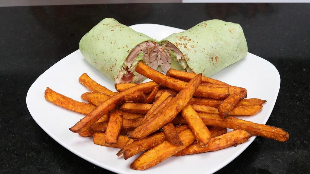Carali’S Wrap · Pulled rotisserie chicken | lettuce | tomato | avocado | choice of spinach or sundried tomato wrap.