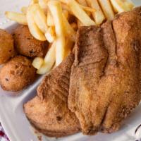 Fillet Tilapia (2 Pcs) · Served with fries and 3 pieces of hush puppies.