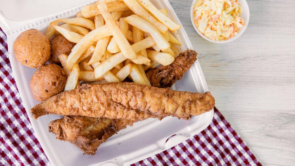 Fried Whiting · Served with fries, 3 pieces of hush puppies, and coleslaw.