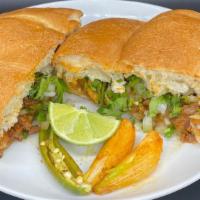 Tortas · Filled with beans, cilantro and onions.