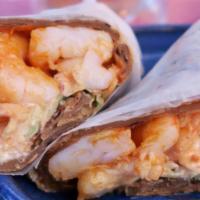 Shrimp Kaathi Roll · Sandwich wrap with shrimp, lime pickle, cabbage, yogurt, & cilantro, paratha.<br />Photo cou...