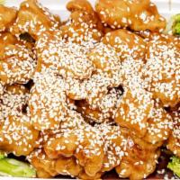 Sesame Chicken · Deep fried breaded chicken with broccoli in sesame sauce.