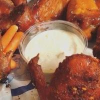 Full Smoked Wings Delivery · 6 whole wings, marinated, slow smoked, flash fried, served with a roll, carrots, and ranch o...