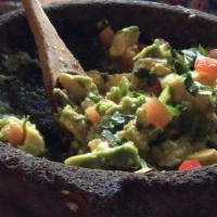 Guacamole & Chips · An 8oz Cup Of Our Freshly Made In  House Guacamole. It Also Includes A Bag Of Chips