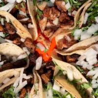 Street Taco  · One Single Soft Small Corn Tortilla, Choice Of Meat, Onion And Cilantro