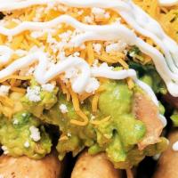 5 Loaded Rolled Tacos · 5 Fried Shredded Beef Rolled Tacos With Cheese And Guacamole, Pico de Gallo. lettuce,