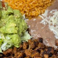#16 Adobada Plate · Pork In Red Sauce Comes With Rice, Beans & guacamole salad consisting of guacamole and pico ...