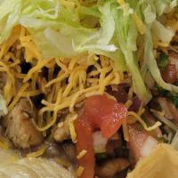 Taco Salad · Comers with the Choice of meat, Beans, Rice,  Guacamole, Pico de Gallo, Sour Cream, Lettuce ...