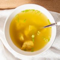 Wonton Soup (L) · A quart of homemade wontons with a hearty chicken soup