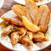 Bbq Shrimp · Large gulf shrimp sauteed with fresh herbs and spices, served with french bread.