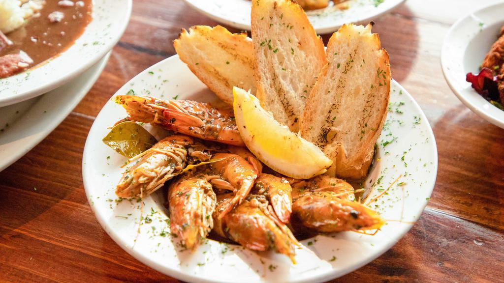 Bbq Shrimp · Large gulf shrimp sauteed with fresh herbs and spices, served with french bread.