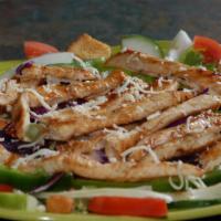 Grilled Chicken Salad · Grilled chicken breast on a bed of lettuce with tomatoes, onions, bell peppers, purple cabba...