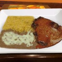 Steak Ranchero · Spicy. T-bone steak with hot sauce on top. Served with re-fried beans, rice, and tortillas.