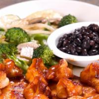 Jalisco Special · Grilled chicken and shrimp with BBQ chipotle sauce served with black beans and vegetables.