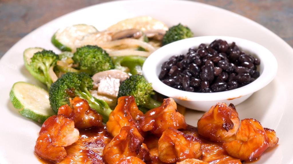Jalisco Special · Grilled chicken and shrimp with BBQ chipotle sauce served with black beans and vegetables.