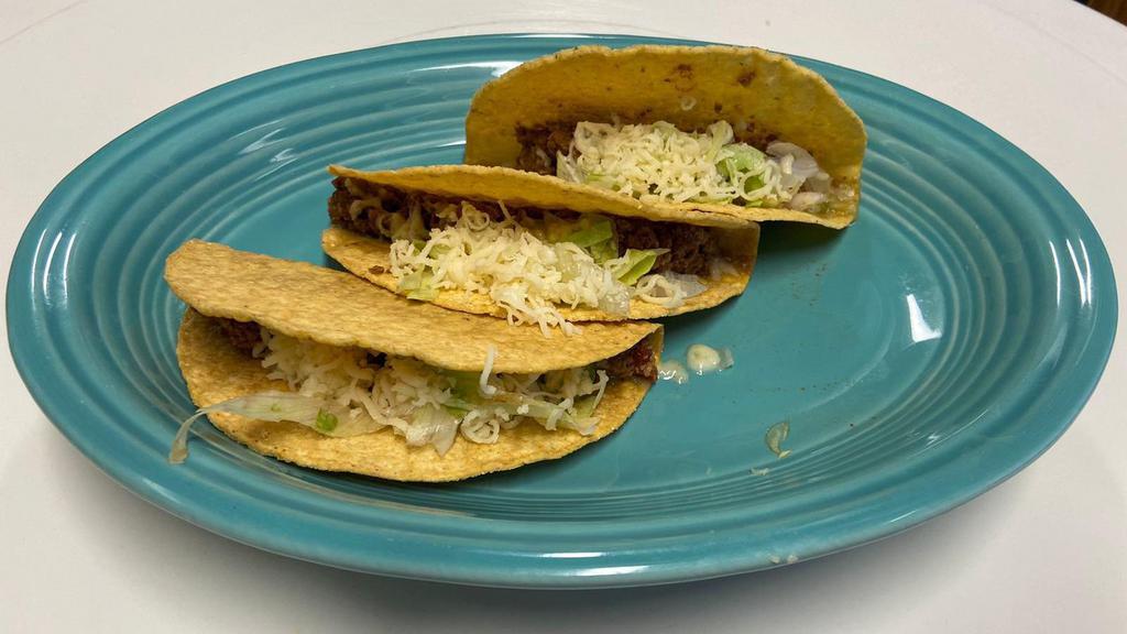 3 Tacos · All tacos served in a soft corn tortilla, and include cilantro, onions, and salsa verde. Served with rice and beans.