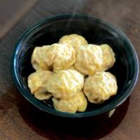 Momos · Nepali style filled dumplings.