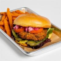 Earth Burger · House made vegan falafel burger served with a side of sweet potato fries.