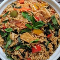 Thai Basil Fried Rice · This traditional dish is for one who loves spicy and basil leaves, stir-fried rice with choi...