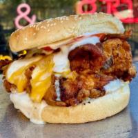 Chicken Bacon Ranch Sandwich · Crispy fried chicken breast topped with a melted mix of mozzarella and cheddar cheese, crisp...