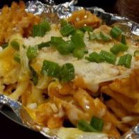 Boot Cheese Fries · Blend of mozzarella and cheddar cheese melted over a large portion of seasoned waffle fries....