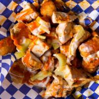 Buffalo Tots · Most popular. Chopped‎ grilled chicken, buffalo sauce, pickled celery, and blue cheese dress...