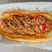 Coney Dog · Hebrew National Grilled Hot dog on a grilled bun, stream of mustard, housemade coney sauce t...