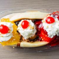 Banana Split · 3 Scoops of premium hand dipped ice cream, topped with Strawberry Glaze, Pineapple Preserves...