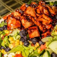 Blueberry Chicken Salad · Smoked chicken tossed in Blueberry BBQ Sauce, tomatoes, cucumbers, blue cheese crumbles, blu...