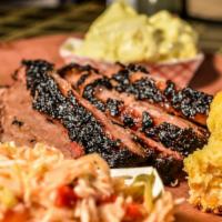 Texas Brisket Plate · 1/2 LB of Brisket. Comes w/ one side and choice of bread.