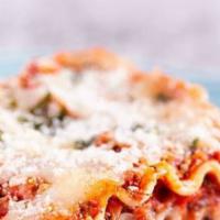 Homemade Meat Lasagna · Layered pasta, seasoned beef, ricotta, pepperoni, mozzarella and Romano cheese in a homemade...