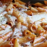 Baked Ziti · Penne noodles mixed with our homemade tomato sauce and ricotta cheese then topped with mozza...