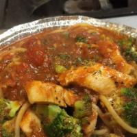 Spaghetti Chicken Broccoli · Sauteed in marinara sauce and served over spaghetti. Served with garlic or plain bread.