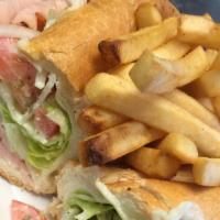 8” Turkey Sub · Served with mayonnaise, provolone cheese, lettuce, tomatoes, onions, and house vinaigrette d...