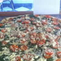 Roma Spinach (Jumbo 24'') · Spinach, tomatoes, garlic, and mozzarella and feta cheeses. No pizza sauce.