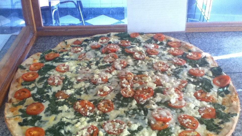 Roma Spinach (Jumbo 24'') · Spinach, tomatoes, garlic, and mozzarella and feta cheeses. No pizza sauce.