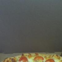 Italian Chicken Pizza (Small 14'') · Chicken, Roma tomatoes, and garlic. No pizza sauce.