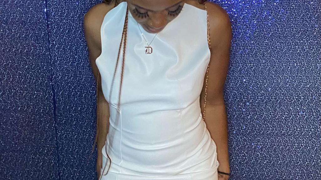 Salt Bae - Dress · Soft white, backless leather dress. The side is slit high up the thigh and buttons at the top around neck. Perfect dress for a girls night out that will surely turn heads! 

Air drying recommended! Fabric may damage in extreme heat. 

Fit: true to size.