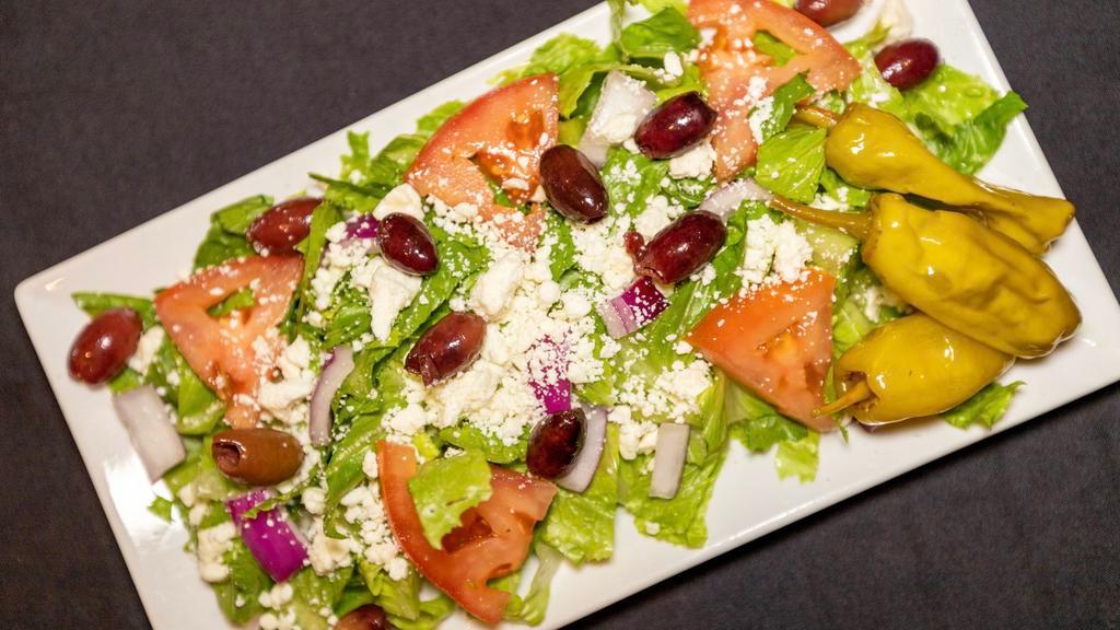 Zen Greek Salad · Romaine lettuce, crumbled feta cheese, kalamata olives, onion, tomato and pepperoncini topped with Greek feta dressing