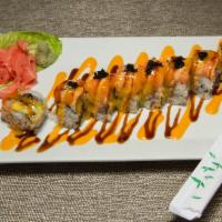 Tokyo Roll · Hot and spicy. Tempura eel, mango, avocado with spicy salmon and black tobiko on top.